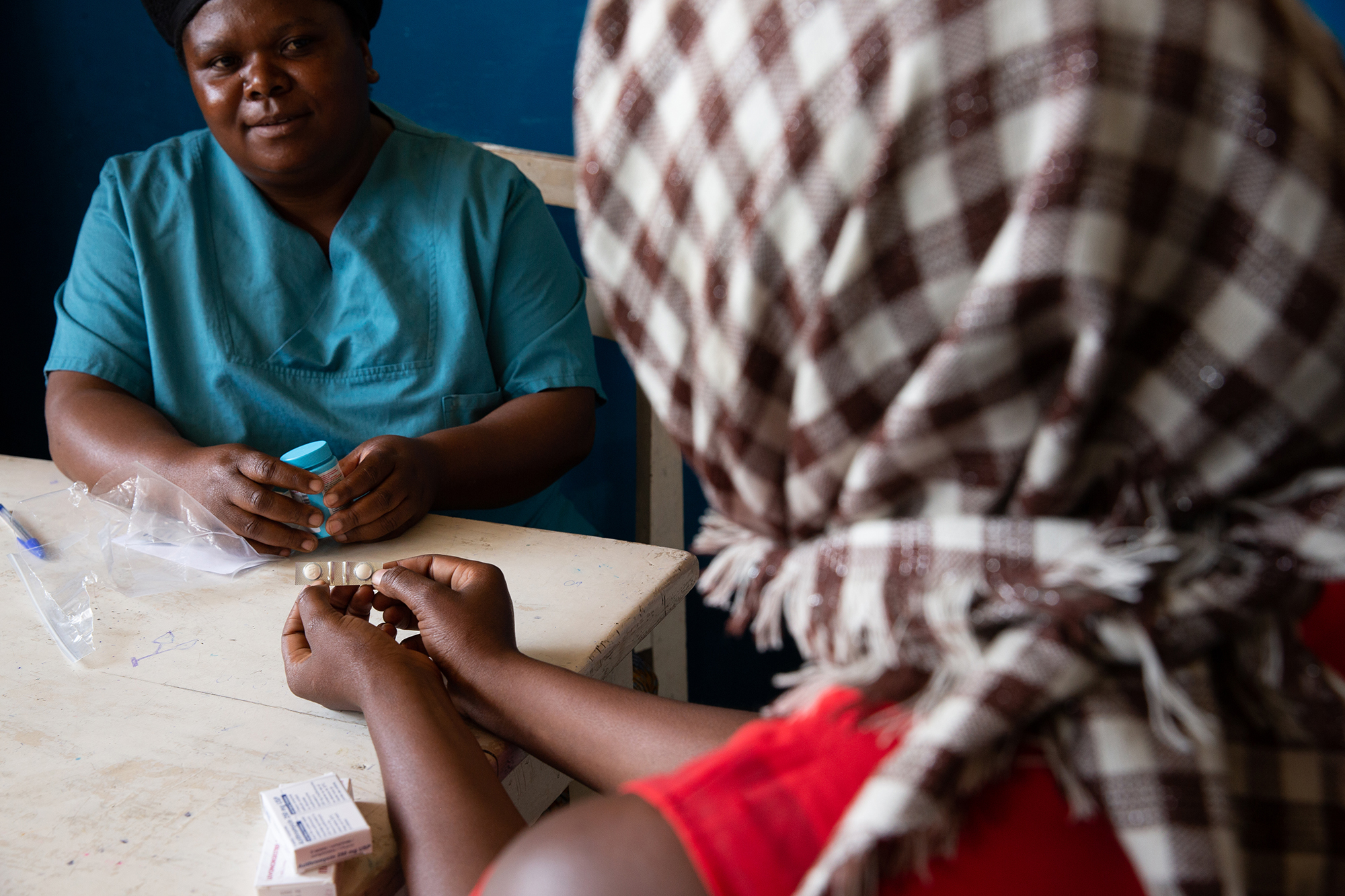 PEP Kits help survivors prevent disease post-attack but must be used within 72 hours. Here, a nurse at the Kitoyi health center in Goma, DRC instructs a patient on its usage. 